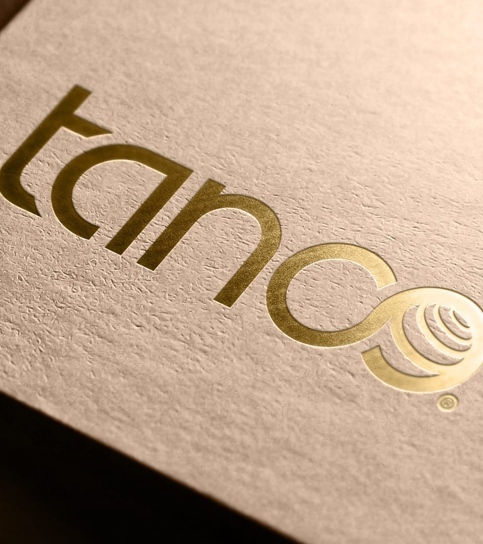 tanco logo in print with gold foil